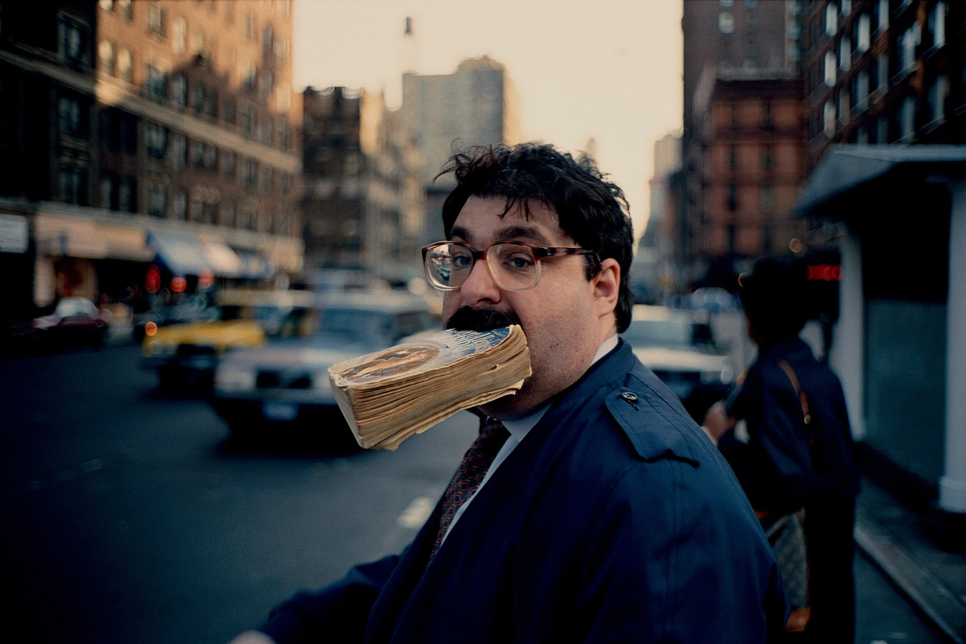 Famous photography of Jeff Mermelstein, man with book in his mouth