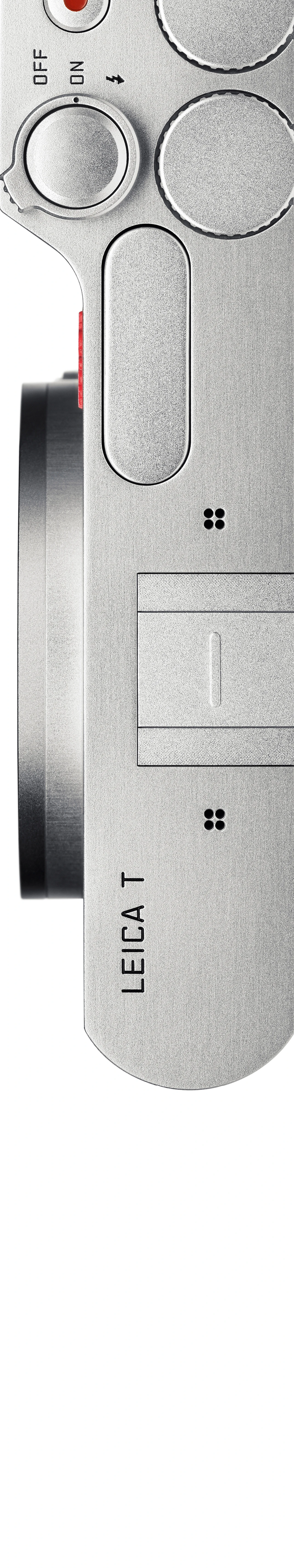 徕卡T的俯拍照片,可见带凹槽的设置旋钮、开/关按钮,以及银色铝合金机身上圆形的红色快门按钮。